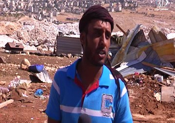 جرافات الاحتلال تهدم خياماً ومزرعة ومرآب لتصليح السيارات في بلدة عناتا بالقدس - لبيبة شريفة - 12 - 7 - 2016