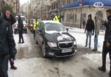 اللحظات الأولى لارتداء مدينة رام الله الثوب الأبيض - 7 - 1 - 2015 - جهاد بركات