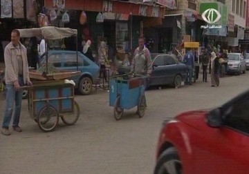 تفشي ظاهرة الباعة والمتجولين في اسواق الضفة الغربية نتيجة شح فرص العمل - 23 - 3 - 2015 - نورا المشهراوي