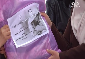 معا لنحمي أطفالنا من البرد.. حملة خيرية بمشاركة 40 جمعية نسوية  - 21 – 1 – 2015 - رمزي أبو جزر