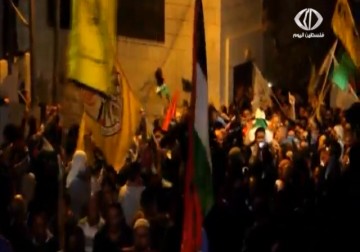 آلاف المواطنين يشيعون جثمان الشهيد أبو غنام رغم إجراءات التضييق الإسرائيلية - 27 – 4 – 2015 – محمد المدهون