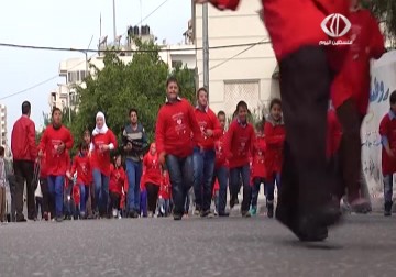 جمعية الحق في الحياة في قطاع  غزة تنظم ماراثونا لذوي متلازمة داون في يومهم العالمي - 25 - 3 - 2015 - نور الزمان شوقي