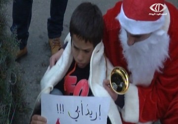 عرض مسرحي صامت أمام دوار المنارة بمدينة رام الله - 30 - 12 - 2014 - ناديا فهد