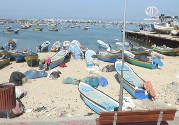 الاتحاد العام لنقابات العمال والنقابة العامة للصيادين في غزة يطالبان بتوسعة مساحة الصيد 12 ميلا – 15 – 3 – 2015 – نورا المشهراوي