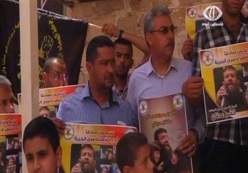 الشيخ خضر عدنان يلتقي محاميه على كرسي متحرك ومكبل اليدين والقدمين – 27 – 5 – 2015 – زينب أبو ضاهر