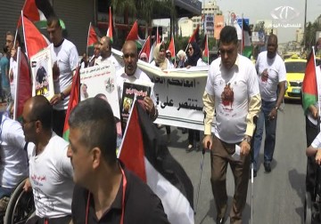 تقرير| اتحاد ذوي الإعاقة ينظم مسيرة تضامنية مع الأسرى - أمون الشيخ