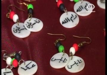 أحلام يونس تجسد التراث الفلسطيني بفنها في بازار التراث العربي - 10 - 3 - 2015 - ناجي أبو لوز