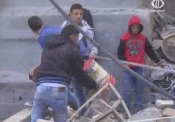 أهالي مخيم شعفاط يعيدون بناء منزل الشهيد ابراهيم العكاري – 06 – 12 – 2015 – احمد جرادات