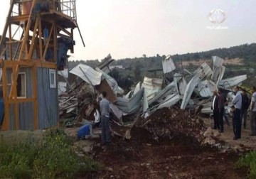 جرافات الاحتلال تهدم مصنا وبركسات في قريتين في مدينة جنين - 10 - 3 - 2015 - .زينب أبو ضاهر 