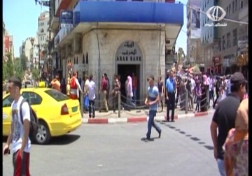 قانون الحد الأدنى للأجور لا يتناسب مع غلاء الأسعار والواقع  المعيشي للفلسطينيين في الضفة – 1 – 5 – 2015 - جيهان عوض