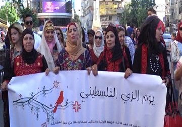 المئات يحيون فعاليات يوم الزي الفلسطيني في الضفة الغربية - امون الشيخ - 26 - 7 - 2016