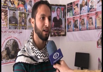 مبادرة لجمع صور شهداء انتفاضة ‏القدس وتعليقها على جدران المنازل في رفح - 14 - 12 - 2015 - علاء سلامة