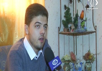 يدير حسن الداودي مشرعا للترجمة عن بعد من داخل منزله في رفح - رمزي أبو جزر - 28 - 11 - 2016