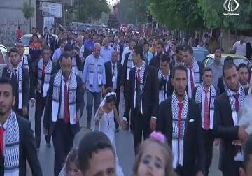 عرس جماعي بعنوان  أفراح من قلب الحصار”في مدينة بيت لاهيا في غزة - إسراء الصفدي - 25 - 7 - 2016”