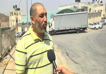 معاناة مستمرة لأهالي شمال القدس بسبب مكب النفايات القريب من أحيائهم - أحمد جرادات - 26 - 8 - 2016