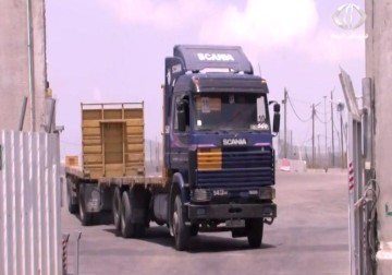 وزارة الاقتصاد في قطاع غزة تفرض رسوم على عملية الاستيراد من الضفة إلى القطاع - 9 - 9- 2015 - رمزي أبو جزر