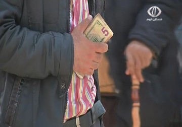 سوق العملات في قطاع غزة يتحول الى واحة للتلاعب في أسعار الصرف بعيدا عن سعر البورصة – 24 – 3 – 2015 - اكرم دلول