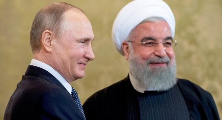 روحاني يهنئ بوتين بيوم روسيا