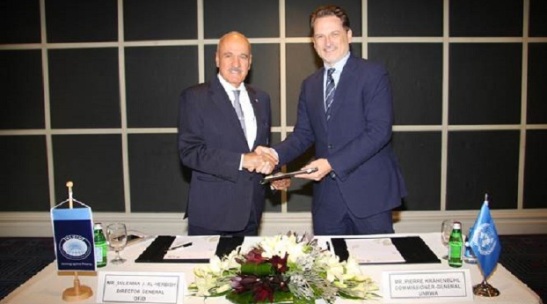 أوفيد وكرينبول يوقعان على منحة لدعم برنامج الأونروا التعليمي بالقدس