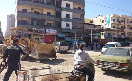 اللجنة الأمنية تبدأ بإزالة البسطات والتعديات في مخيم البداوي