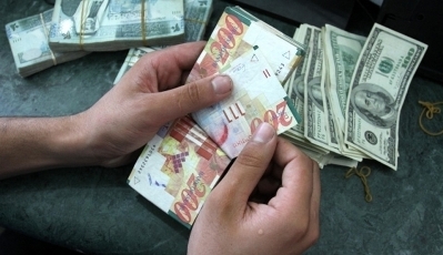 صرف العملات مقابل الشيكل