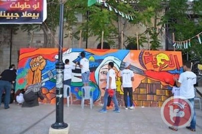 البيرة.. جدارية تضامناً مع الأسرى في معركتهم