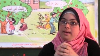 هبة الشرفا.. أول معلمة من ذوي 