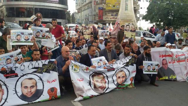 بالصور.. الجهاد تنظم مسيرة تضامنية بالضفة مع الأسرى المضربين