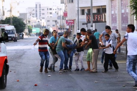 الخليل ... 13 إصابة برصاص الاحتلال احداها خطرة