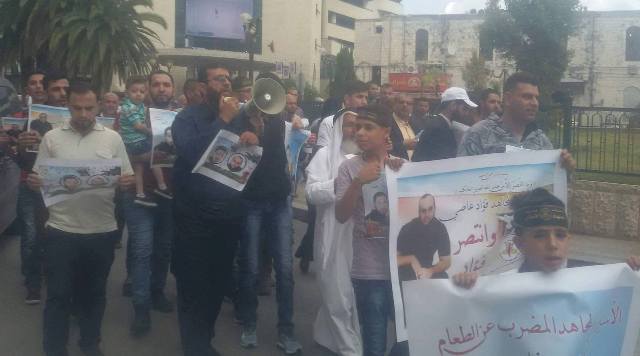 بالصور.. الجهاد تنظم وقفة تضامنية مع الأسرى في نابلس