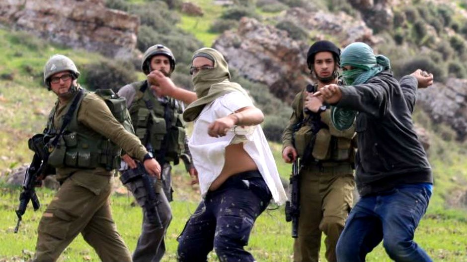 settlers-israeli-attacking-people-stones.jpg